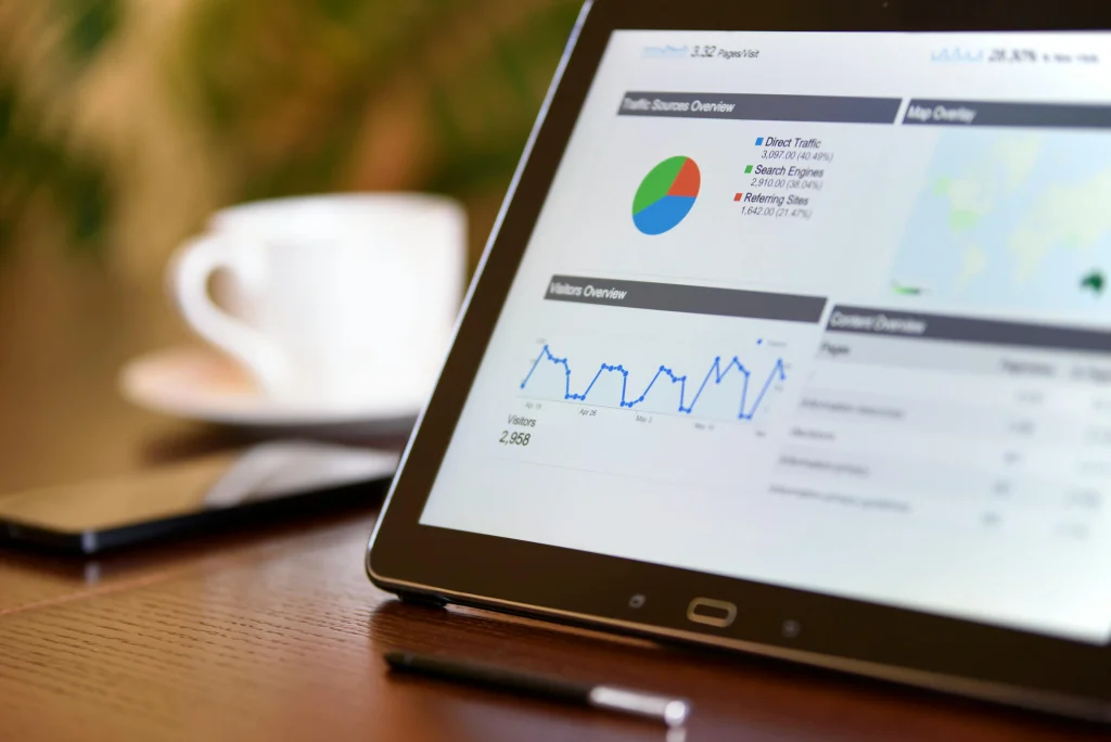 Tablet displaying analytics charts for website monetization and ad revenue tracking
