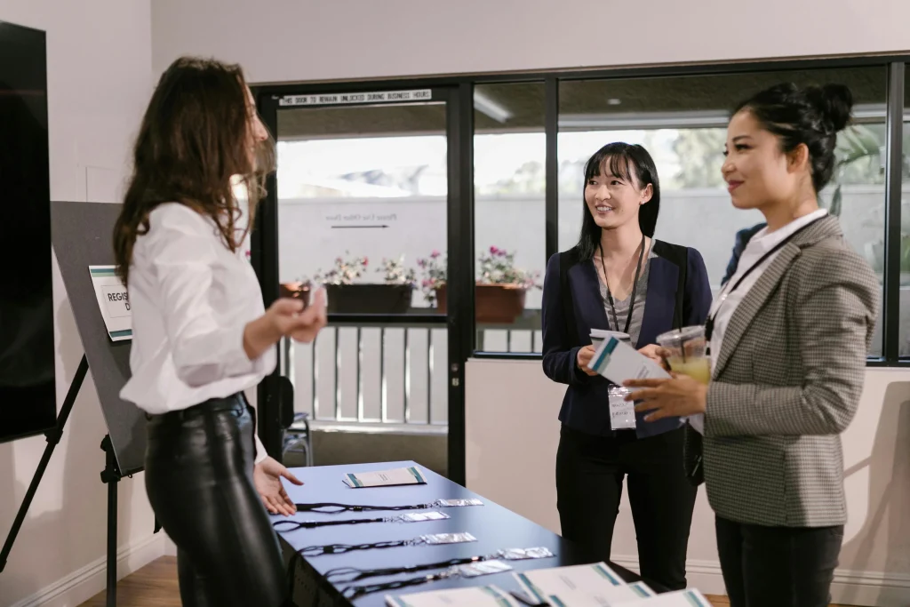 Professional business networking at a membership community event