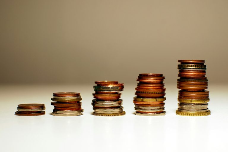 Growing revenue stacks representing business directory monetization
