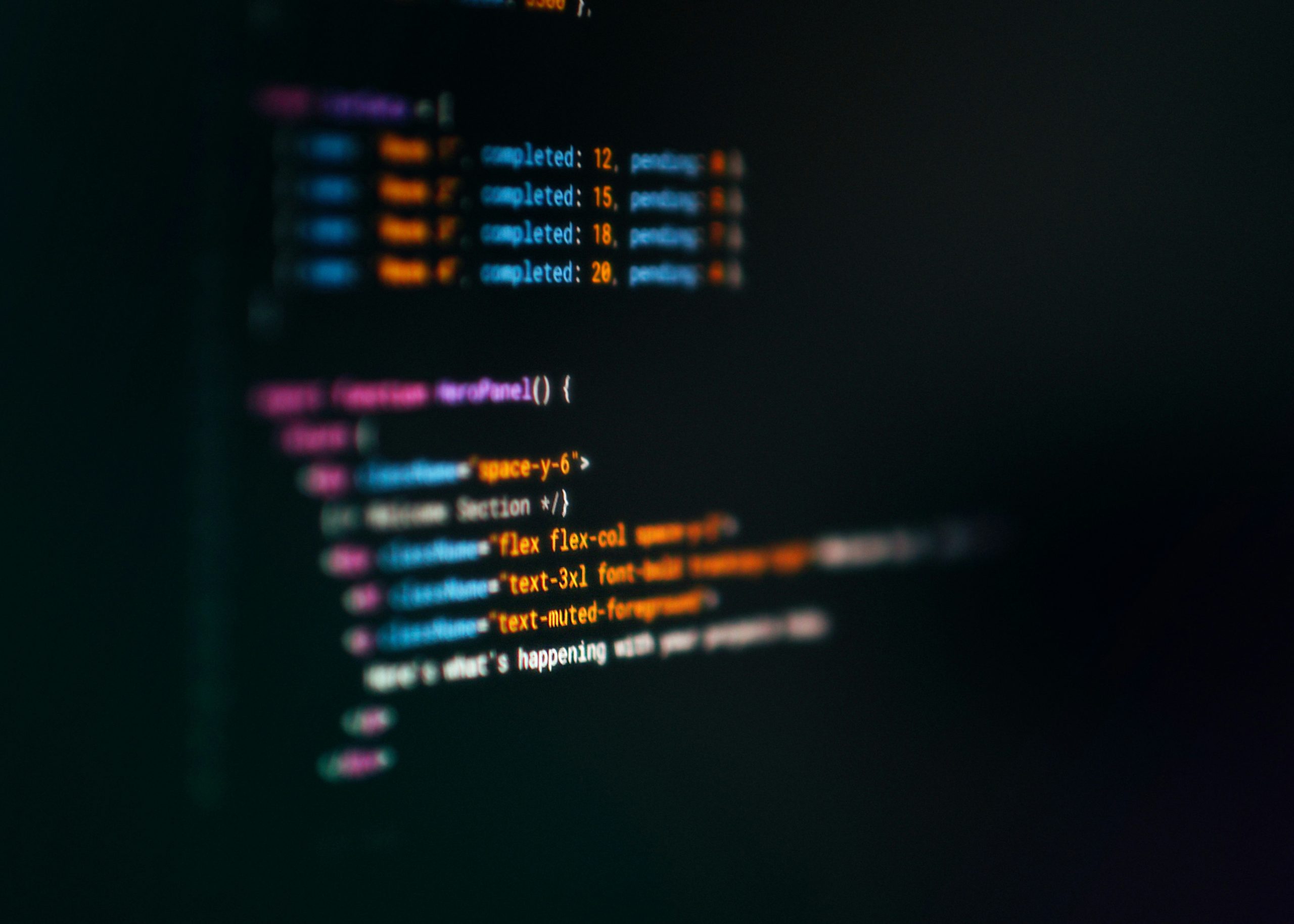 Dark code editor screen showing JavaScript JSX code for EDD REST API integration development