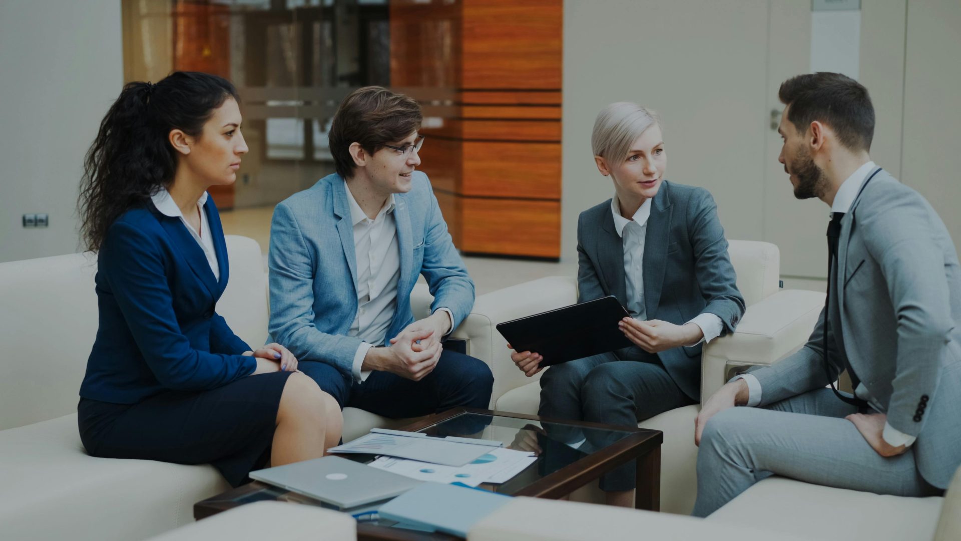 Team discussing HR and payroll strategy at a digital agency office
